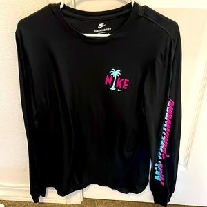 Super nice Nike shirt. Medium and black. No longer fits me only worn a few times